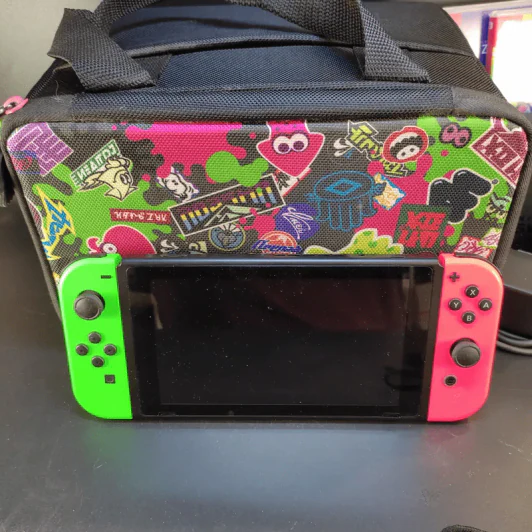 เครื่อง Nintendo Switch + 4 จอย + 3 เกม + กระเป๋า (มือสองเล่นได้ปกติ) รูปที่ 2