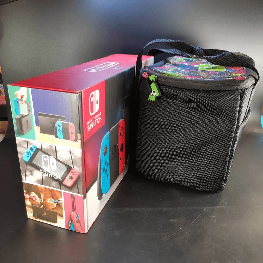 เครื่อง Nintendo Switch + 4 จอย + 3 เกม + กระเป๋า (มือสองเล่นได้ปกติ) รูปที่ 21