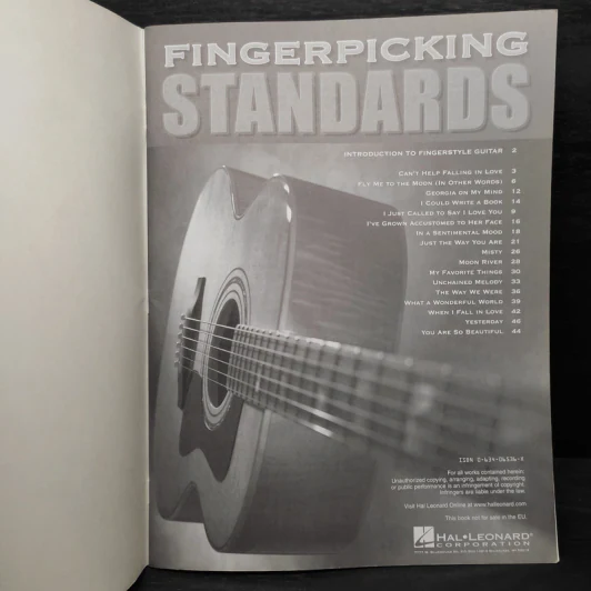 Fingerpicking Standards: 17 Songs Arranged for Solo Guitar in Standard Notation & Tablature รูปที่ 6