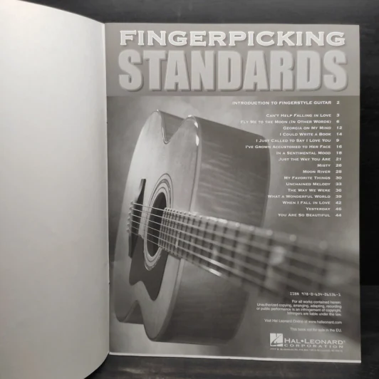 Fingerpicking Standards: 17 Songs Arranged for Solo Guitar in Standard Notation & Tablature รูปที่ 5