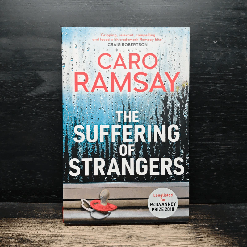 The Suffering of Strangers - Caro Ramsay รูปที่ 1