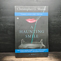 A Haunting Smile - Christopher G. Moore