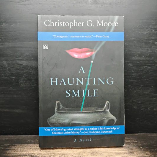 A Haunting Smile - Christopher G. Moore รูปที่ 1