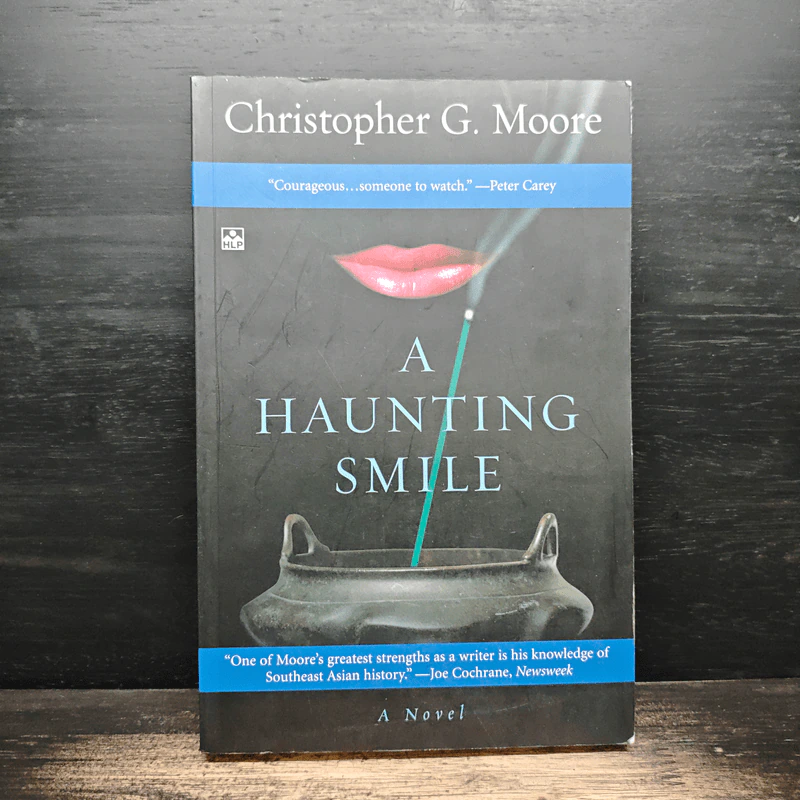 A Haunting Smile - Christopher G. Moore รูปที่ 1