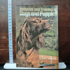 Behavior and Training of Dogs and Puppies - Louis L. Vine, D.V.M.